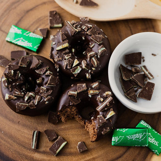 3 Andes Protein Donuts next to stray Andes® mints